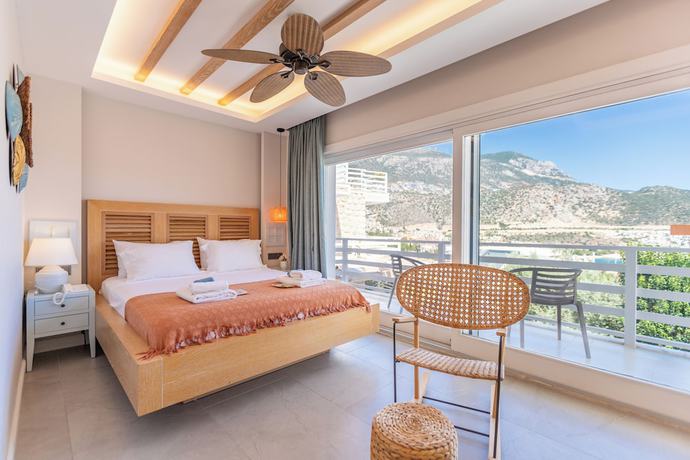 Imagen de la habitación del Kalkan Saray Suites - Adults Only. Foto 15