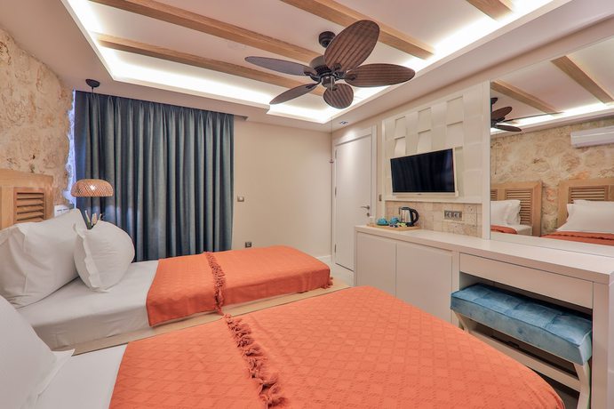 Imagen de la habitación del Kalkan Saray Suites - Adults Only. Foto 17