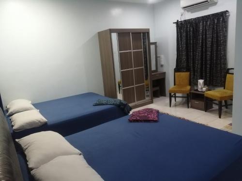 Imagen de la habitación del Kamar Musafir MMS. Foto 12
