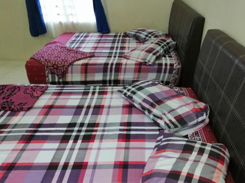 Imagen de la habitación del Kamar Musafir MMS. Foto 15