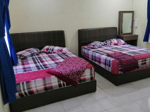 Imagen de la habitación del Kamar Musafir MMS. Foto 16