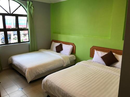 Imagen de la habitación del Kangsar Hotel. Foto 2