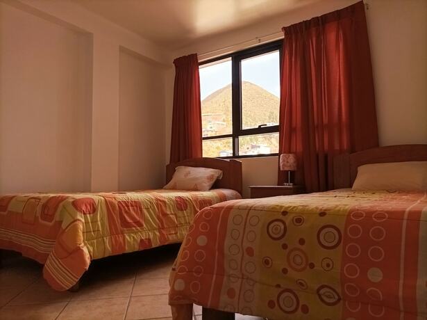 Imagen de la habitación del Kantu Hospedaje. Foto 18