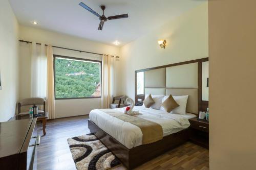 Imagen de la habitación del Kapalin Resorts Manali. Foto 18
