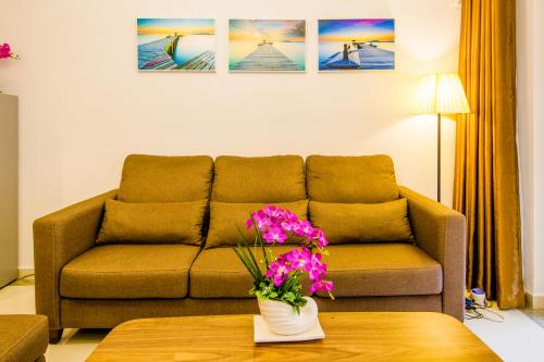 Imagen de la habitación del Kapasi Grand Hote Spring Apartment. Foto 7