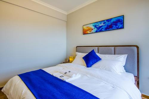 Imagen de la habitación del Kapasi Grand Hote Spring Apartment. Foto 8