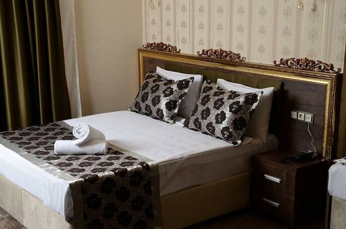 Imagen de la habitación del Karacalar Suit Otel. Foto 19