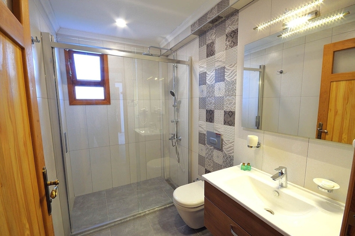 Imagen de la habitación del Karaincir Suit Otel. Foto 15