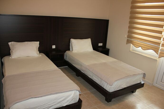 Imagen de la habitación del Karasu Ozcan Hotel. Foto 13