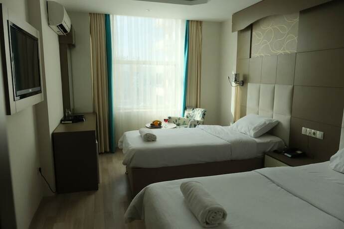 Imagen de la habitación del Karat Ayseli Otel. Foto 11