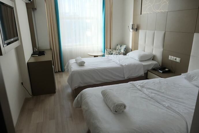 Imagen de la habitación del Karat Ayseli Otel. Foto 13