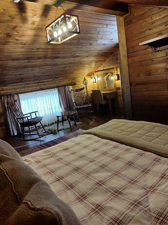 Imagen de la habitación del Karinna Forest Houses. Foto 15