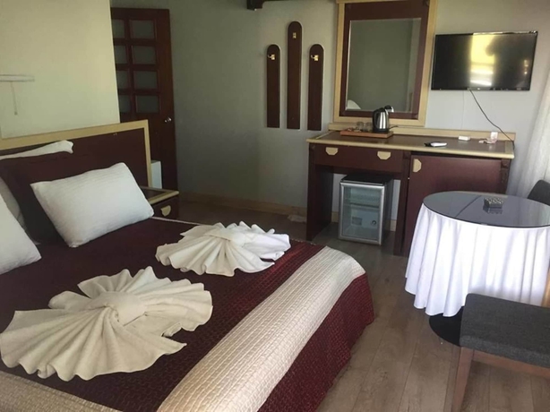 Imagen de la habitación del Karsiyaka Otel. Foto 11