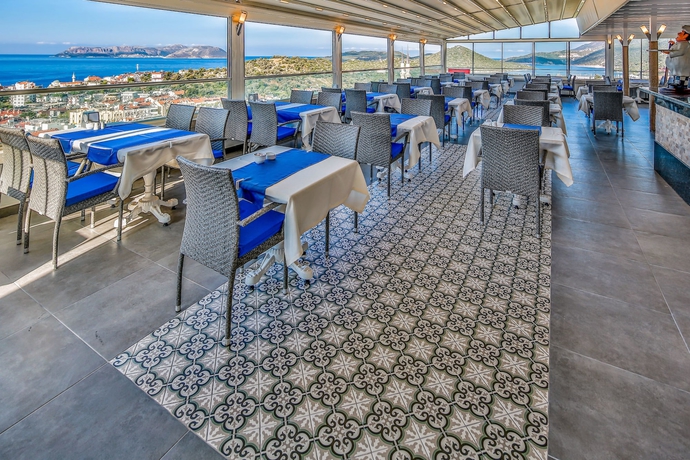 Imagen del bar/restaurante del Kas Artemis Hotel. Foto 6