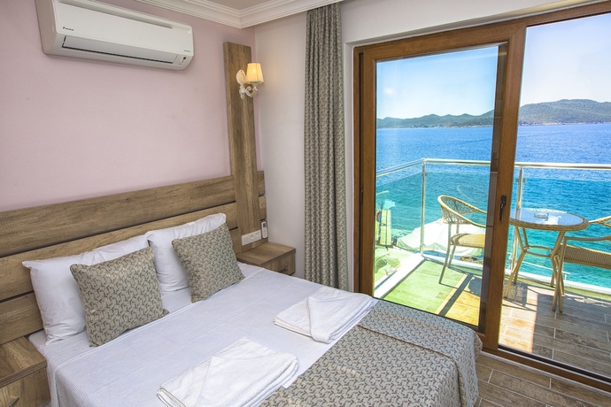 Imagen de la habitación del Kas Otel. Foto 2