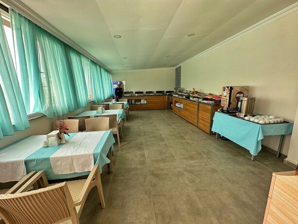 Imagen del bar/restaurante del Kaya Garden Otel Side. Foto 12