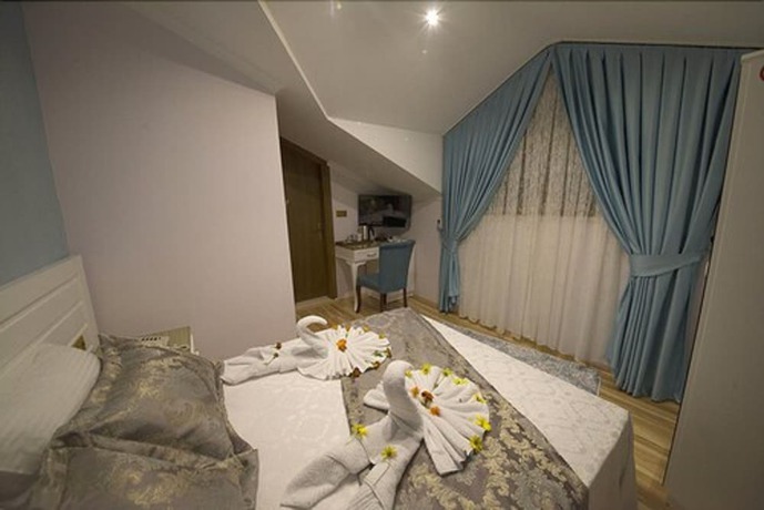 Imagen de la habitación del Kayi Hotel. Foto 7