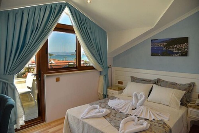 Imagen de la habitación del Kayi Hotel. Foto 15