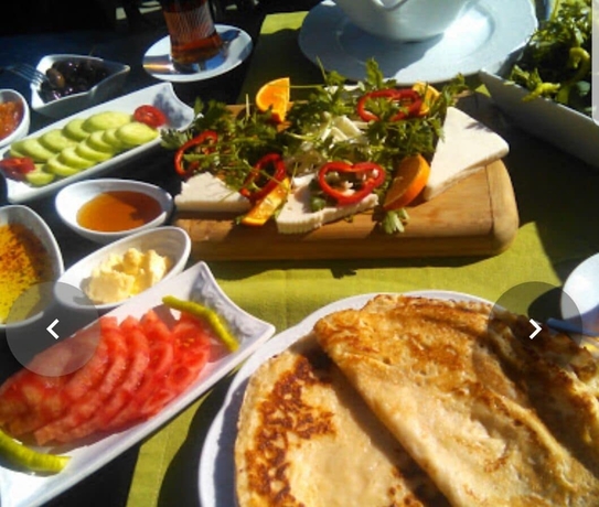 Imagen del bar/restaurante del Kazdaglari Karye M&uuml;ze Otel. Foto 12