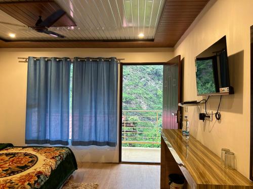 Imagen de la habitación del Kedar Valley Resorts by KV. Foto 20