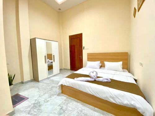 Imagen de la habitación del Kelud Syariah Guesthouse. Foto 15