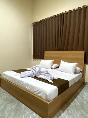 Imagen de la habitación del Kelud Syariah Guesthouse. Foto 16