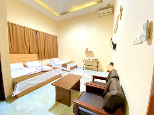 Imagen de la habitación del Kelud Syariah Guesthouse. Foto 20