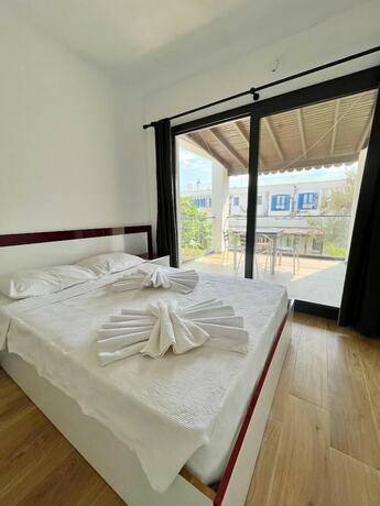 Imagen de la habitación del Kemancı Suites and Restaurant and Beach. Foto 17