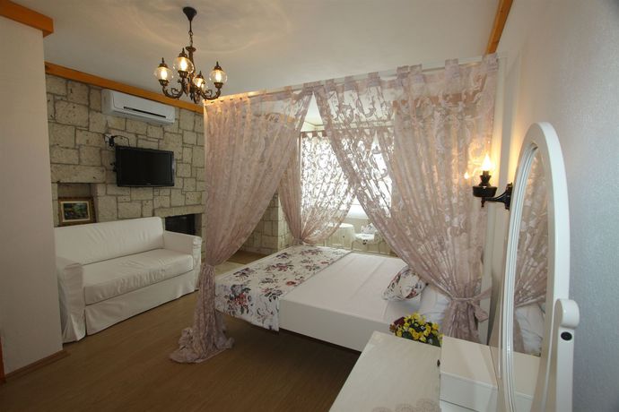 Imagen de la habitación del Kemerlihan Deluxe Hotel. Foto 11