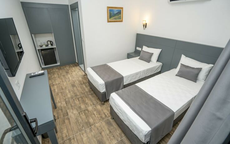 Imagen de la habitación del Kensington Kerdime Beach Hotel. Foto 12