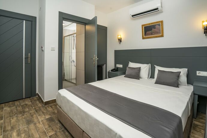 Imagen de la habitación del Kensington Kerdime Beach Hotel. Foto 13