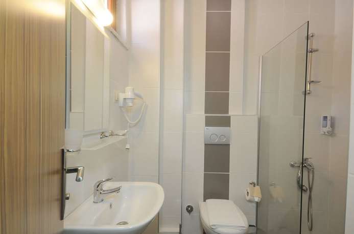 Imagen de la habitación del Kent Studyo Hotel. Foto 8