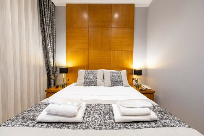 Imagen de la habitación del King Suits Hotel. Foto 17