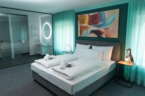 Imagen de la habitación del Kirchenwirt Stubenberg Kunsthotel. Foto 18