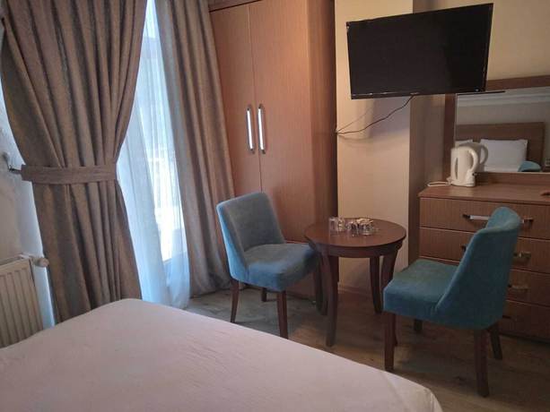 Imagen de la habitación del Kizkalesi Hotel. Foto 9
