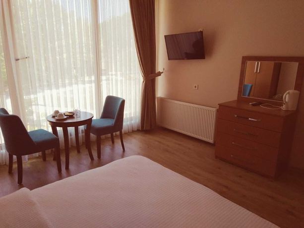 Imagen de la habitación del Kizkalesi Hotel. Foto 12