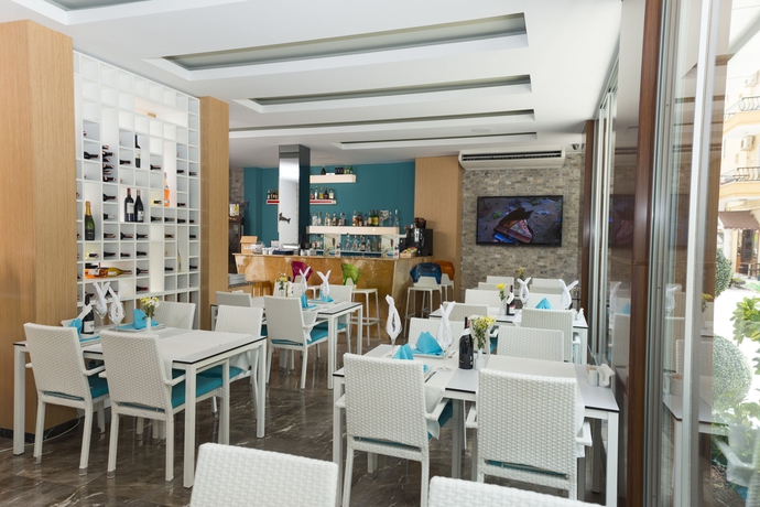Imagen del bar/restaurante del Kleopatra Suit Hotel. Foto 3