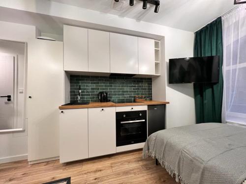 Imagen de la habitación del Kościuszki Cozy Apartments Centrum. Foto 15