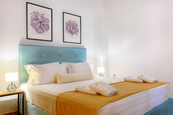 Imagen de la habitación del Komitsa Luxury Apartments. Foto 4