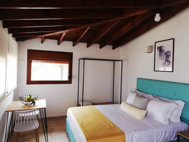 Imagen de la habitación del Komitsa Luxury Apartments. Foto 6