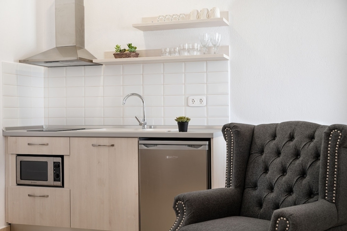 Imagen de la habitación del Komitsa Luxury Apartments. Foto 11