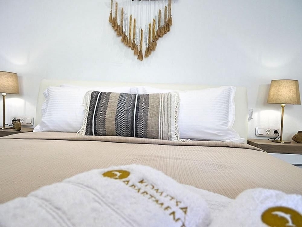 Imagen de la habitación del Komitsa Luxury Apartments. Foto 16