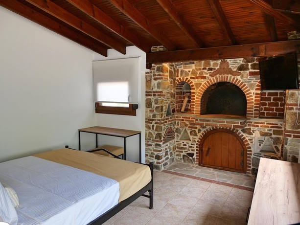 Imagen de la habitación del Komitsa Luxury Apartments. Foto 19