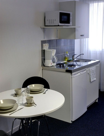 Imagen de la habitación del Kosy Appart'h&ocirc;tels &ndash; Le Cours Moreau. Foto 10