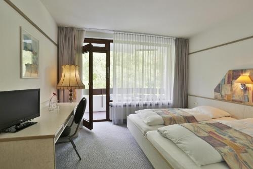 Imagen de la habitación del Kronen Hotel. Foto 7