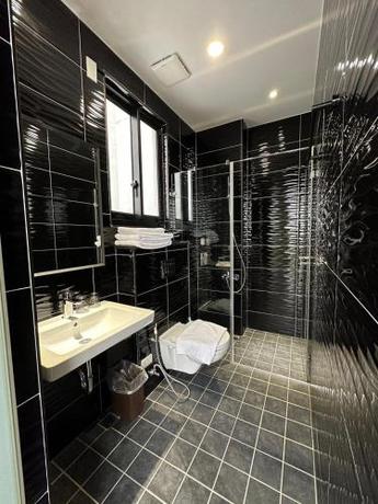 Imagen de la habitación del 安平包棟民宿 - 尋雨 - 台南民宿Ktv影音室限包棟使用. Foto 13