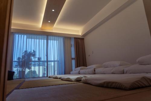Imagen de la habitación del 安平包棟民宿 - 尋雨 - 台南民宿Ktv影音室限包棟使用. Foto 19