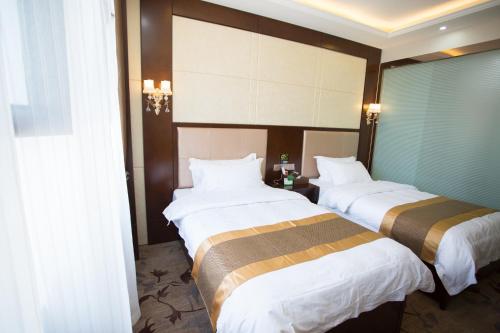 Imagen de la habitación del Kuerle Jinrun Holiday Hotel Airport Road. Foto 7