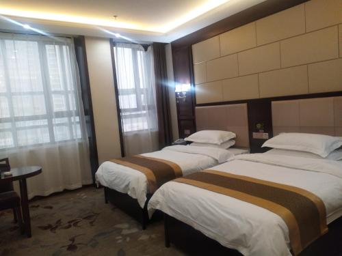 Imagen de la habitación del Kuerle Jinrun Holiday Hotel Airport Road. Foto 8