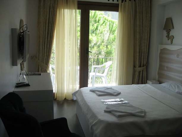 Imagen de la habitación del Kumsal Butik Hotel. Foto 15